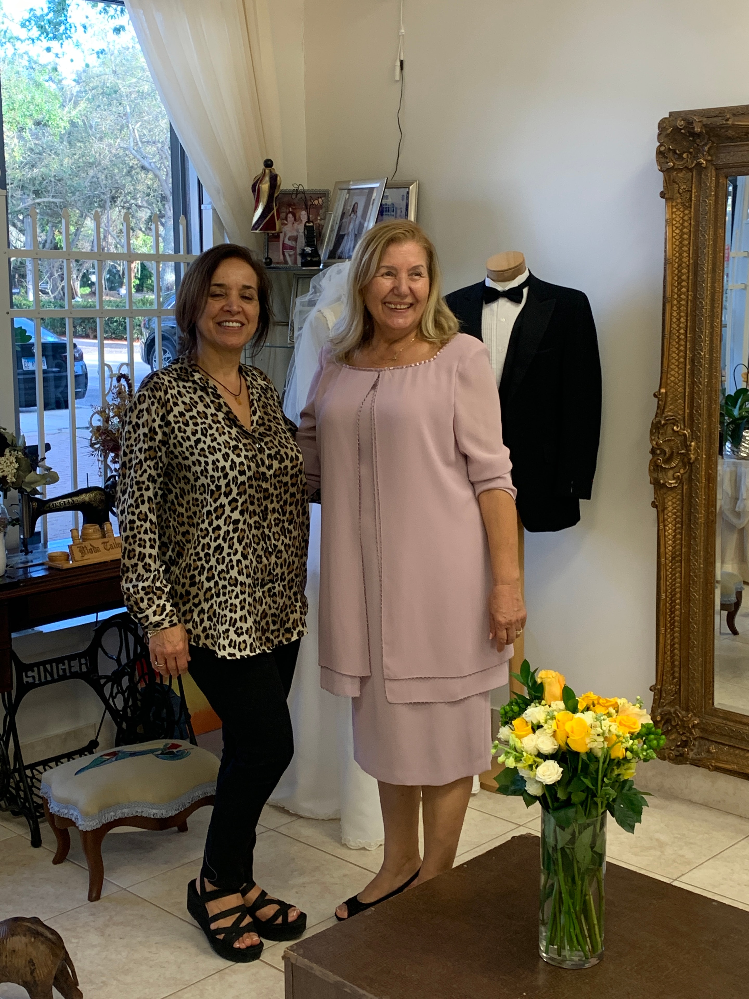Tailor fitting a client