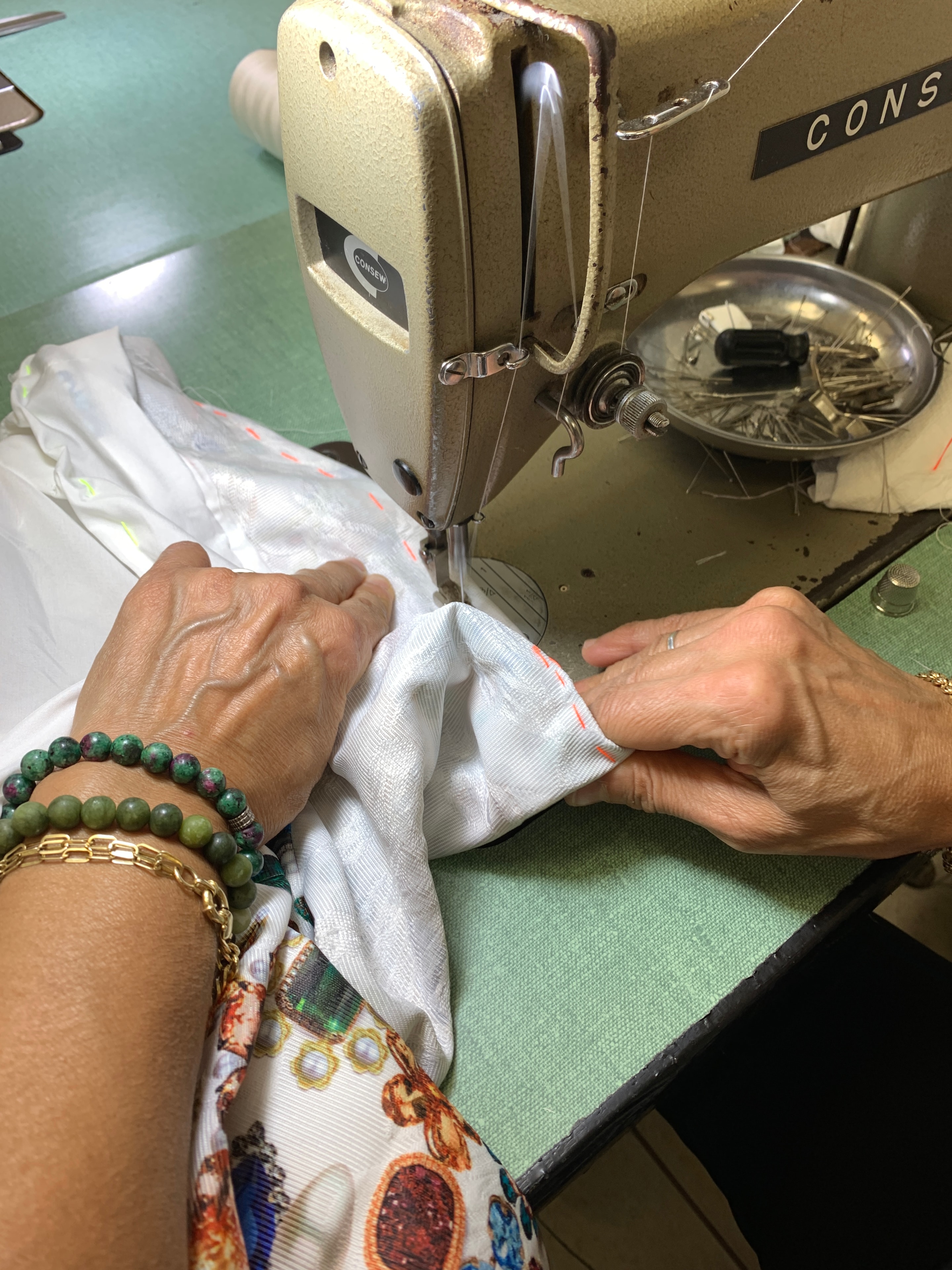 Hands at the sewing machine